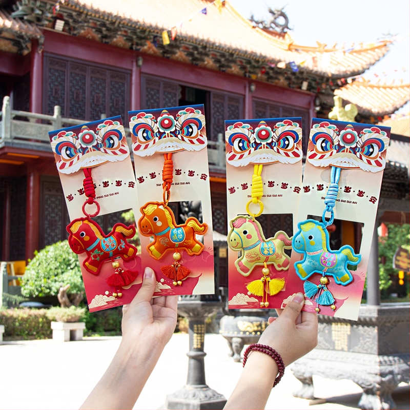 Arvoka aasta tikitud kotike - kaasaskantav ripats võtmehoidja, etniline stiil (Bränd: Qingman; Stiil: Etniline; Töötlus: pool- käsitsi, pool-mehaaniline; Materjal: Muu).