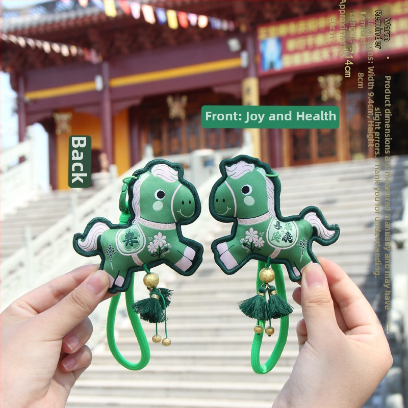 Arvoka aasta tikitud kotike - kaasaskantav ripats võtmehoidja, etniline stiil (Bränd: Qingman; Stiil: Etniline; Töötlus: pool- käsitsi, pool-mehaaniline; Materjal: Muu).