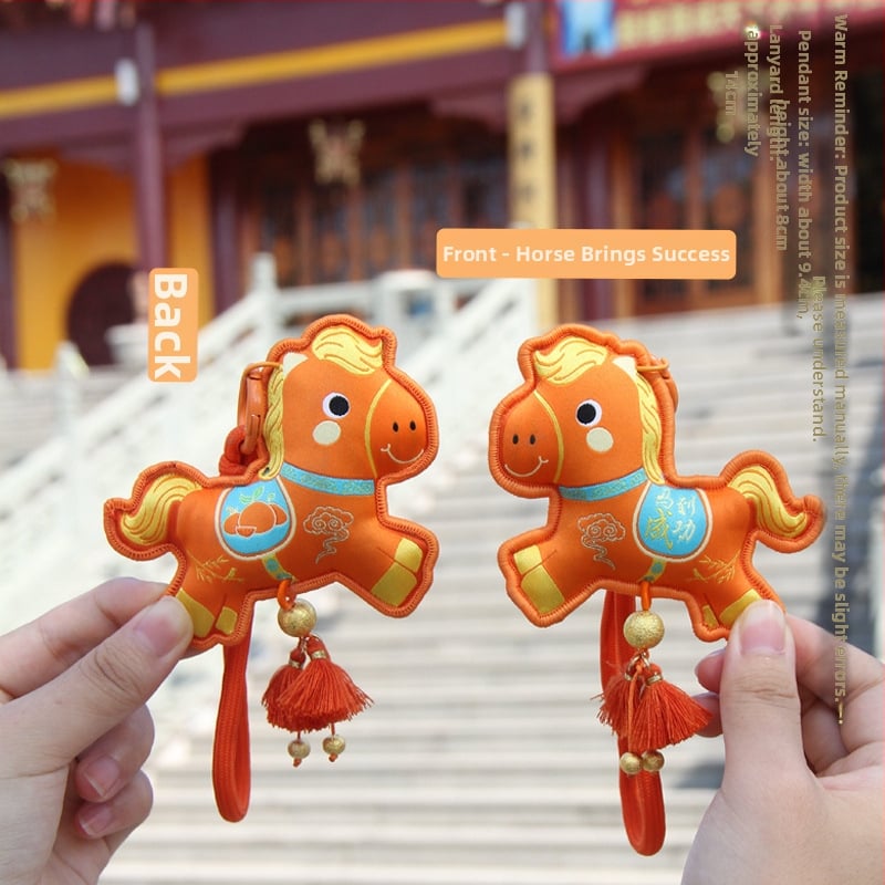 Arvoka aasta tikitud kotike - kaasaskantav ripats võtmehoidja, etniline stiil (Bränd: Qingman; Stiil: Etniline; Töötlus: pool- käsitsi, pool-mehaaniline; Materjal: Muu).