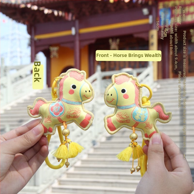 Arvoka aasta tikitud kotike - kaasaskantav ripats võtmehoidja, etniline stiil (Bränd: Qingman; Stiil: Etniline; Töötlus: pool- käsitsi, pool-mehaaniline; Materjal: Muu).