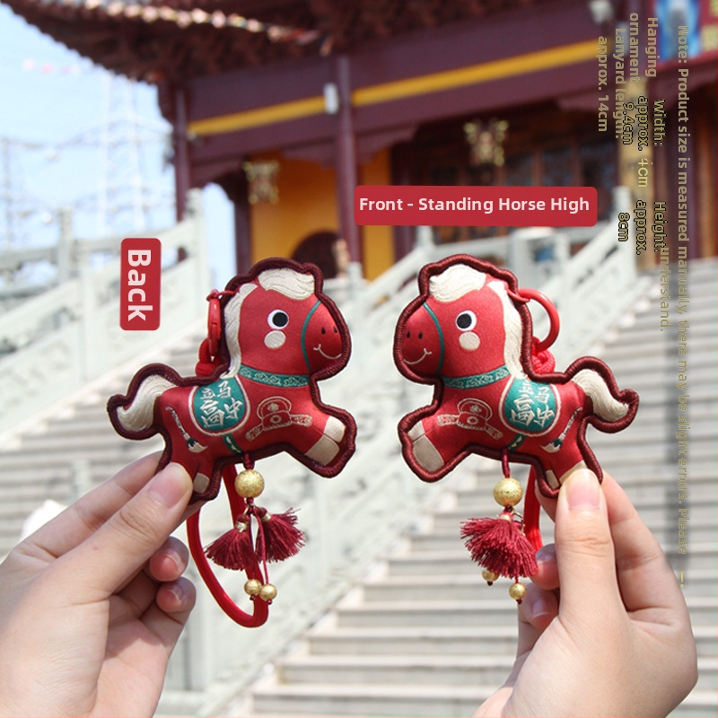 Arvoka aasta tikitud kotike - kaasaskantav ripats võtmehoidja, etniline stiil (Bränd: Qingman; Stiil: Etniline; Töötlus: pool- käsitsi, pool-mehaaniline; Materjal: Muu).