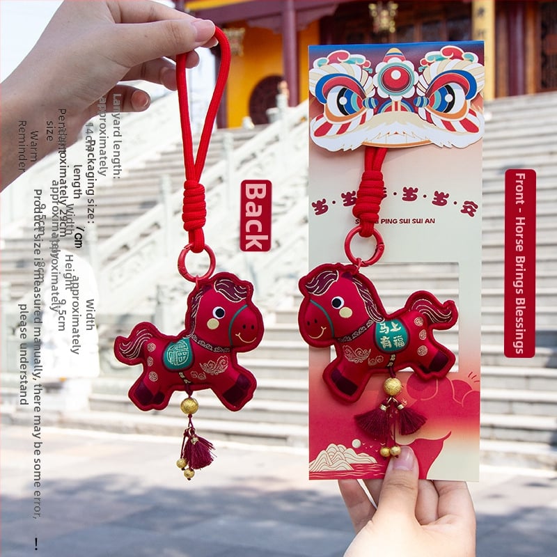 Arvoka aasta tikitud kotike - kaasaskantav ripats võtmehoidja, etniline stiil (Bränd: Qingman; Stiil: Etniline; Töötlus: pool- käsitsi, pool-mehaaniline; Materjal: Muu).