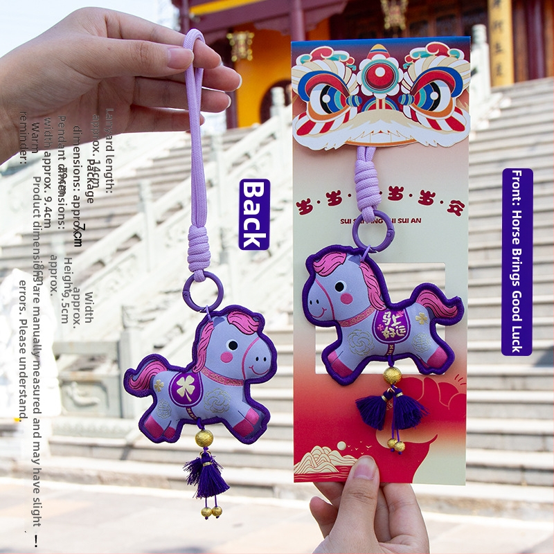 Arvoka aasta tikitud kotike - kaasaskantav ripats võtmehoidja, etniline stiil (Bränd: Qingman; Stiil: Etniline; Töötlus: pool- käsitsi, pool-mehaaniline; Materjal: Muu).