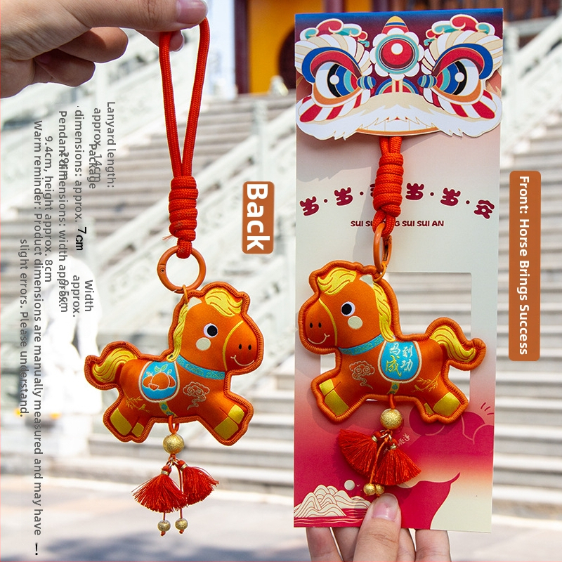 Arvoka aasta tikitud kotike - kaasaskantav ripats võtmehoidja, etniline stiil (Bränd: Qingman; Stiil: Etniline; Töötlus: pool- käsitsi, pool-mehaaniline; Materjal: Muu).