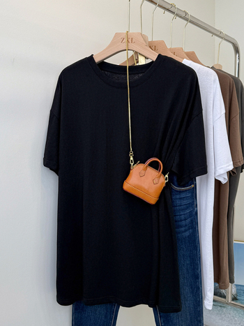 Majica kratkih rukava od pamuka i poliestera (50-70% pamuk, 30-50% poliester); okrugli izrez; kratki rukavi; širok kroj