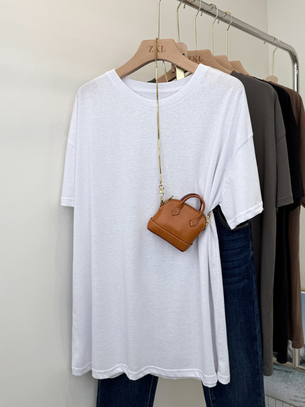 Majica kratkih rukava od pamuka i poliestera (50-70% pamuk, 30-50% poliester); okrugli izrez; kratki rukavi; širok kroj