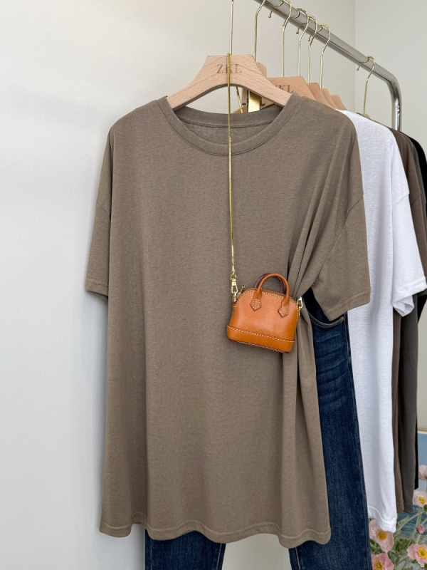 Majica kratkih rukava od pamuka i poliestera (50-70% pamuk, 30-50% poliester); okrugli izrez; kratki rukavi; širok kroj