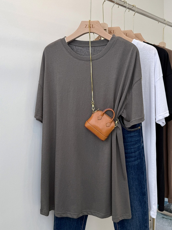 Majica kratkih rukava od pamuka i poliestera (50-70% pamuk, 30-50% poliester); okrugli izrez; kratki rukavi; širok kroj