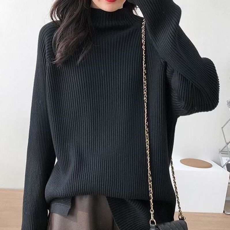 Pleten pulover s vertikalnim prugama, srednja duljina, slobodan kroj, polu-visoki ovratnik, dugi rukavi