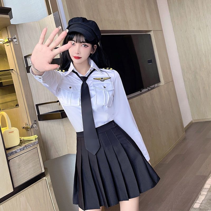 JK stjuardeses uniformas komplekts – Chenille audums ar elastānu (<30%), plisēta svārki, roku rogu formu piedurknes, piedurknēm garums 5/4, Pavasaris 2025