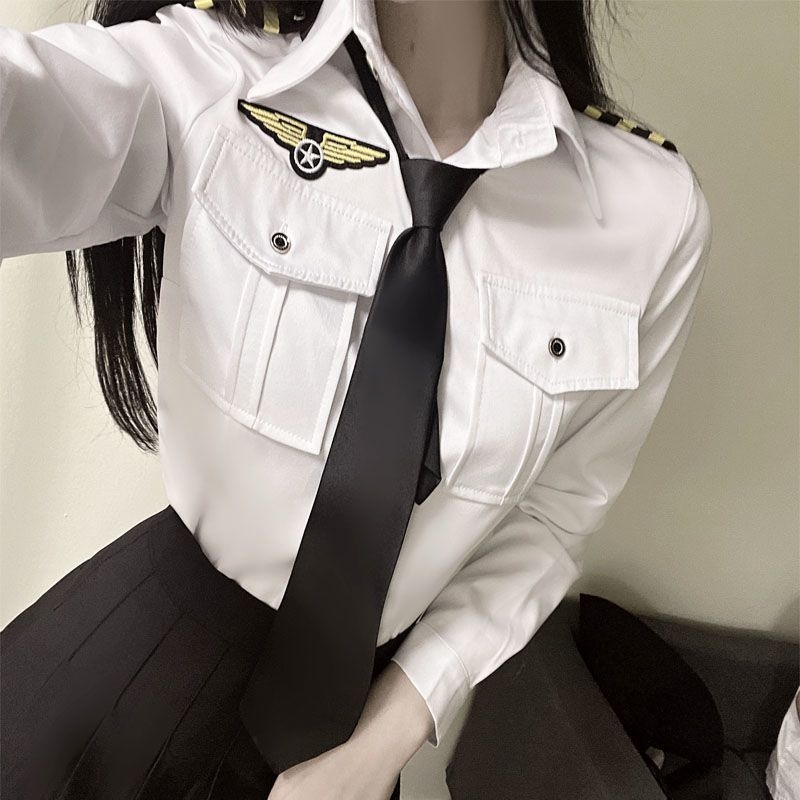 JK stjuardeses uniformas komplekts – Chenille audums ar elastānu (<30%), plisēta svārki, roku rogu formu piedurknes, piedurknēm garums 5/4, Pavasaris 2025