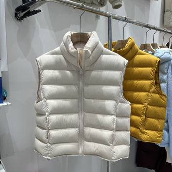 Női tollmellény, rövid fazon, álló gallér, 86–90% fehér kacsa tollpihé, poliészter