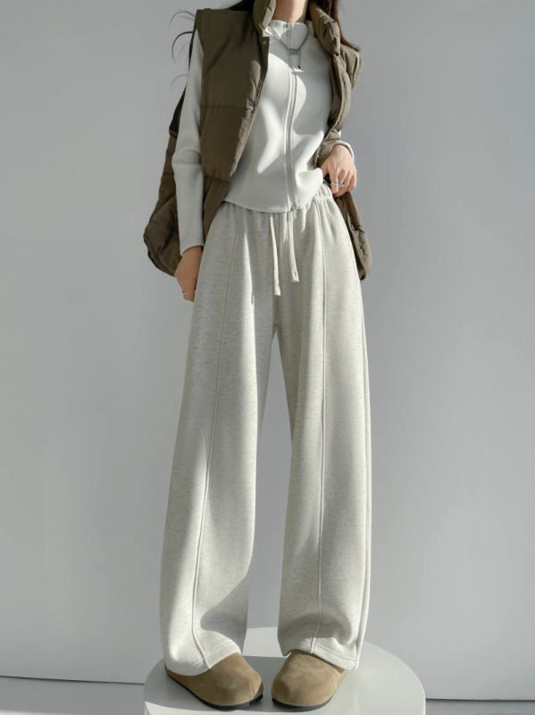 Γυναικεία παντελόνια φόρμας από βαμβακό-πολυεστέρα, με ελαστική μέση, πάνελ ραφών και χαλαρή γραμμή, χειμώνας 2025