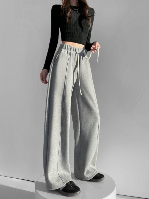 Γυναικεία παντελόνια φόρμας από βαμβακό-πολυεστέρα, με ελαστική μέση, πάνελ ραφών και χαλαρή γραμμή, χειμώνας 2025