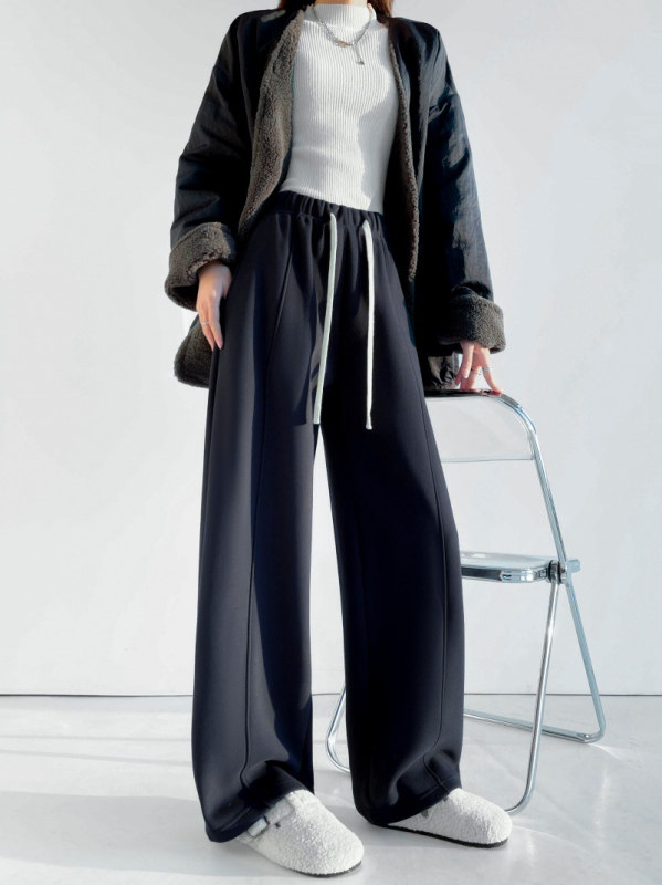 Γυναικεία παντελόνια φόρμας από βαμβακό-πολυεστέρα, με ελαστική μέση, πάνελ ραφών και χαλαρή γραμμή, χειμώνας 2025