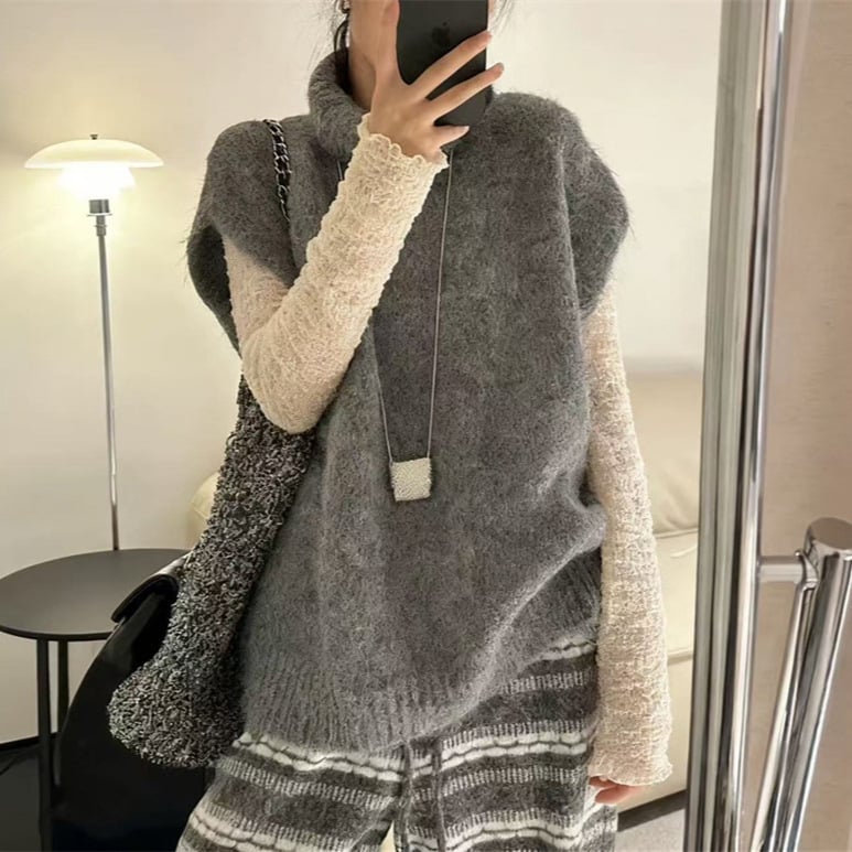 Vesta s visokim ovratnikom, slojeviti pleteni top, jednobojni uzorak, smjesa akril-poliester (50-70% akril, 30-50% poliester), jesen 2025