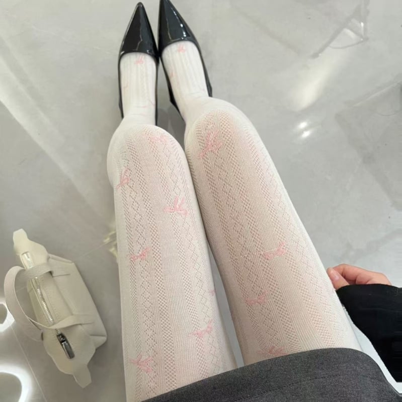 Pamukaste tajice s uzorkom mašne, s čarapama, srednje debljine, prozračne i upijaju znoj, sadržaj pamuka 30–50%