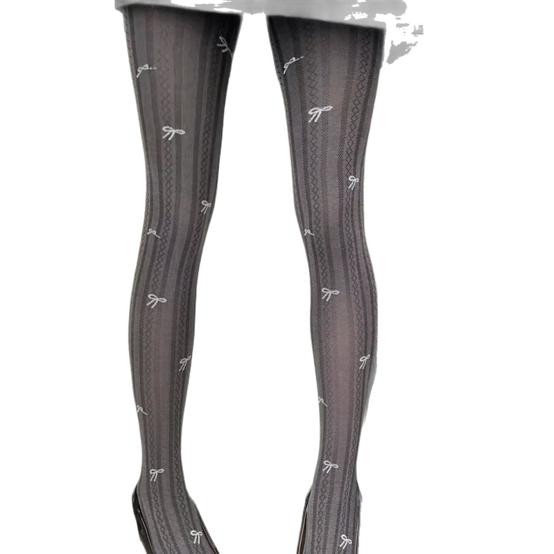 Pamukaste tajice s uzorkom mašne, s čarapama, srednje debljine, prozračne i upijaju znoj, sadržaj pamuka 30–50%