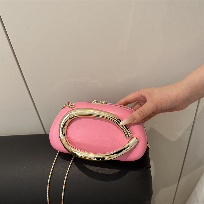 Ženska crossbody torba tipa kutija s metalnim detaljima — zatvarač, ovalni oblik, poliester podstava