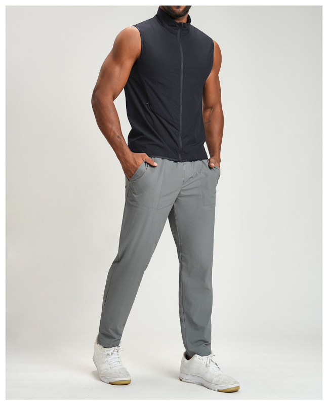 Bez piedurknēm veste baseball stilā, 90% pārstrādāts neilons, 10% elastāns, pildījums no kokvilnas, stāvošs apkakles, ādai draudzīgs, elpojošs, ātri žūst.