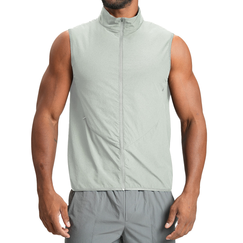 Bez piedurknēm veste baseball stilā, 90% pārstrādāts neilons, 10% elastāns, pildījums no kokvilnas, stāvošs apkakles, ādai draudzīgs, elpojošs, ātri žūst.