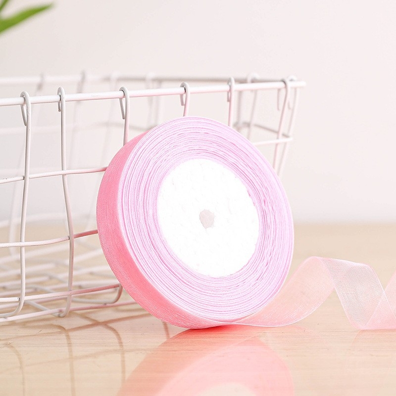 Dekoratyvinė juostelė - 50% viskozės ir 50% dirbtinės medvilnės mišinys; skirta drabužiams, namų tekstilei ir pramoninei naudojimui