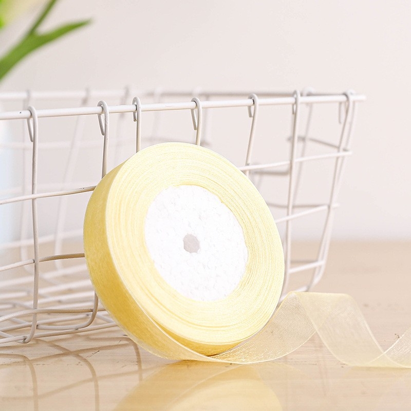 Dekoratyvinė juostelė - 50% viskozės ir 50% dirbtinės medvilnės mišinys; skirta drabužiams, namų tekstilei ir pramoninei naudojimui