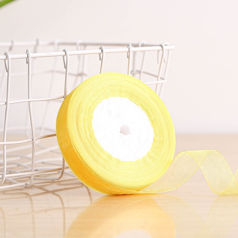 Dekoratyvinė juostelė - 50% viskozės ir 50% dirbtinės medvilnės mišinys; skirta drabužiams, namų tekstilei ir pramoninei naudojimui