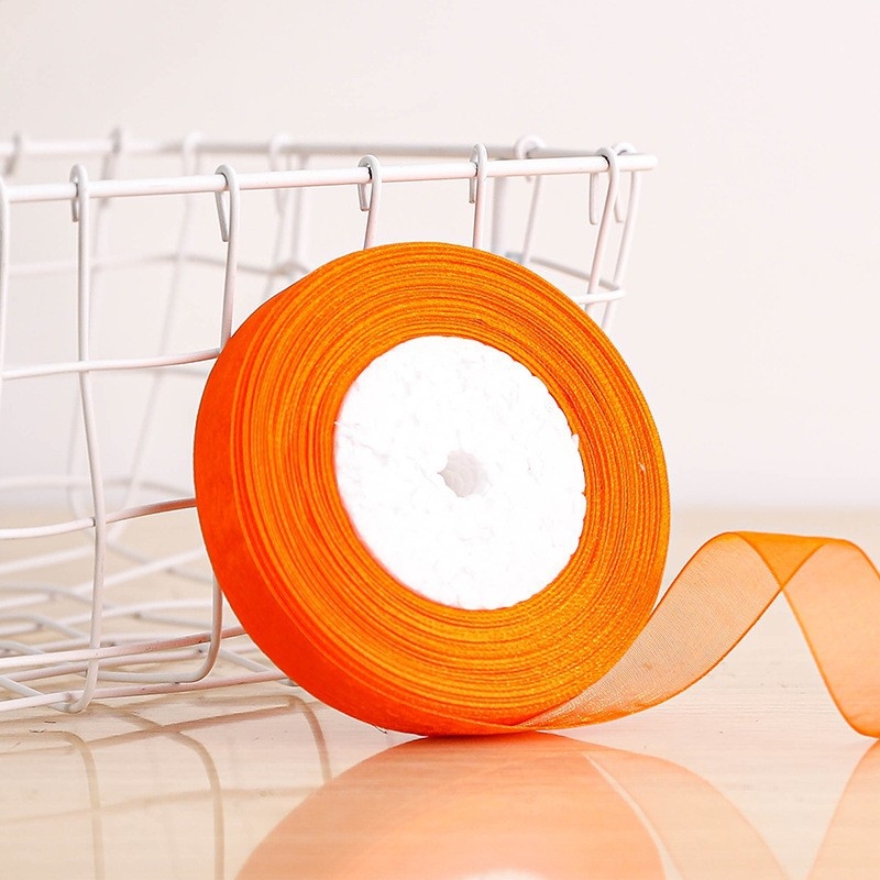 Dekoratyvinė juostelė - 50% viskozės ir 50% dirbtinės medvilnės mišinys; skirta drabužiams, namų tekstilei ir pramoninei naudojimui