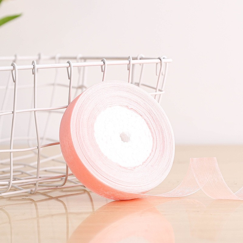 Dekoratyvinė juostelė - 50% viskozės ir 50% dirbtinės medvilnės mišinys; skirta drabužiams, namų tekstilei ir pramoninei naudojimui