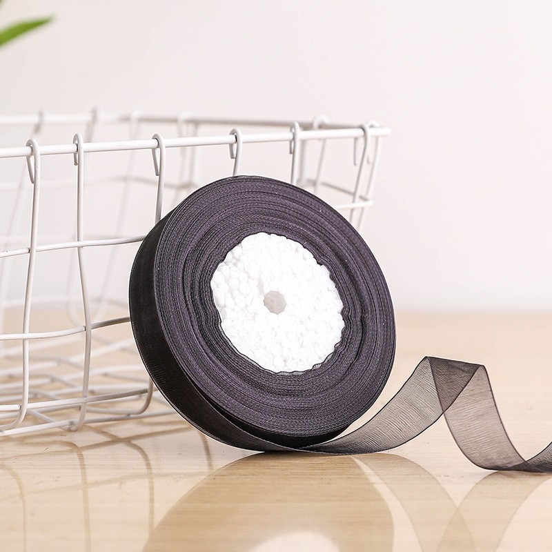 Dekoratyvinė juostelė - 50% viskozės ir 50% dirbtinės medvilnės mišinys; skirta drabužiams, namų tekstilei ir pramoninei naudojimui