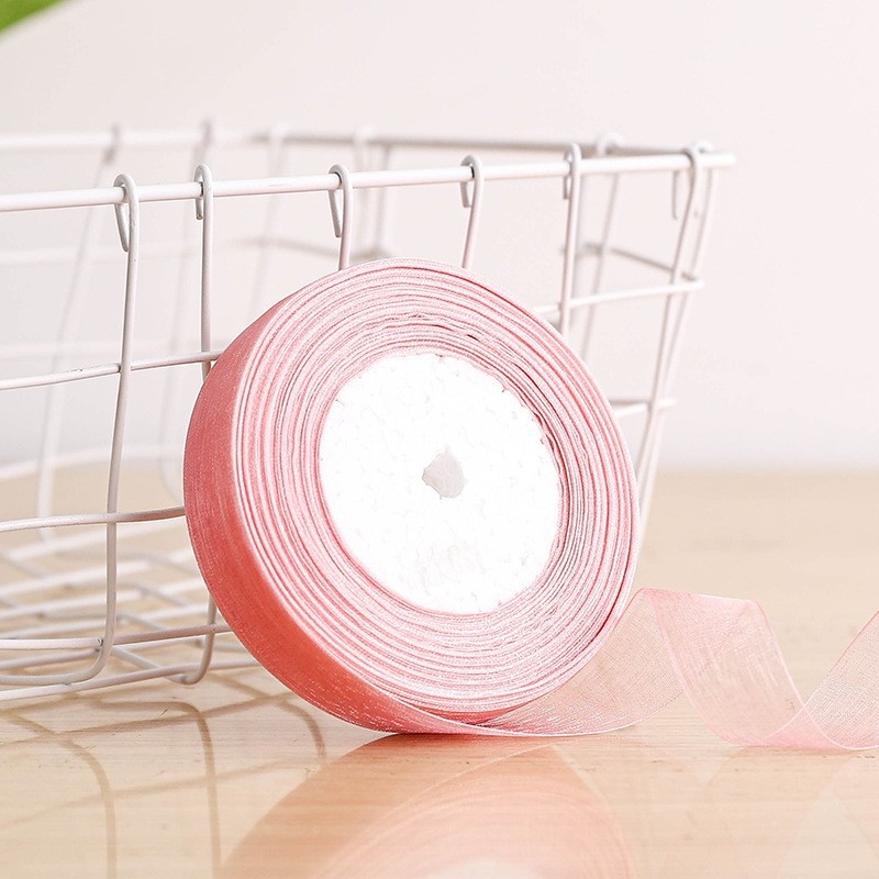 Dekoratyvinė juostelė - 50% viskozės ir 50% dirbtinės medvilnės mišinys; skirta drabužiams, namų tekstilei ir pramoninei naudojimui