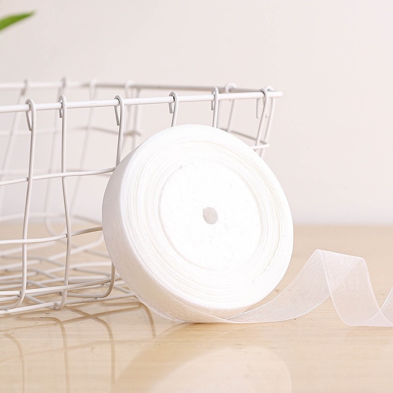 Dekoratyvinė juostelė - 50% viskozės ir 50% dirbtinės medvilnės mišinys; skirta drabužiams, namų tekstilei ir pramoninei naudojimui