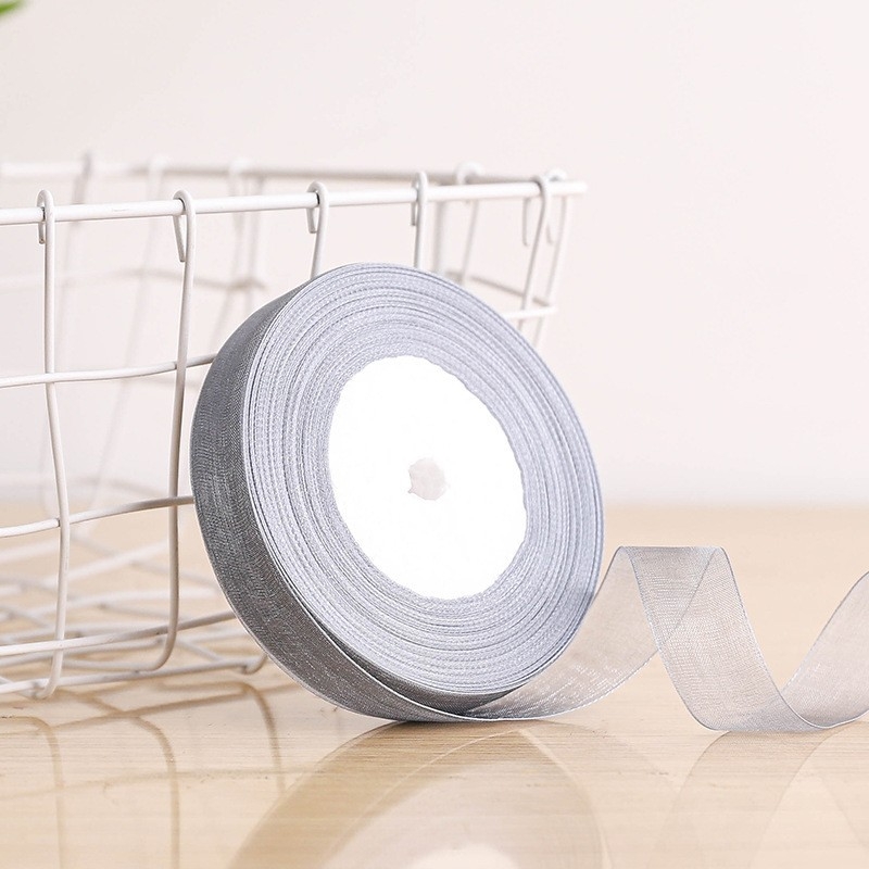 Dekoratyvinė juostelė - 50% viskozės ir 50% dirbtinės medvilnės mišinys; skirta drabužiams, namų tekstilei ir pramoninei naudojimui