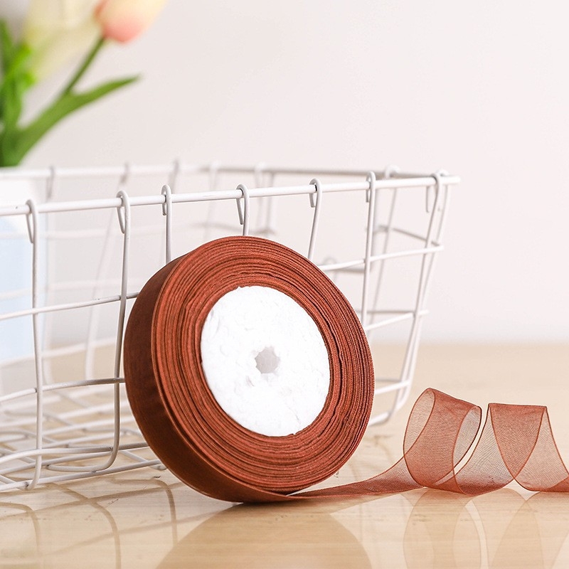 Dekoratyvinė juostelė - 50% viskozės ir 50% dirbtinės medvilnės mišinys; skirta drabužiams, namų tekstilei ir pramoninei naudojimui