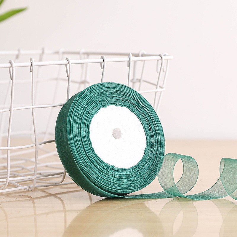 Dekoratyvinė juostelė - 50% viskozės ir 50% dirbtinės medvilnės mišinys; skirta drabužiams, namų tekstilei ir pramoninei naudojimui