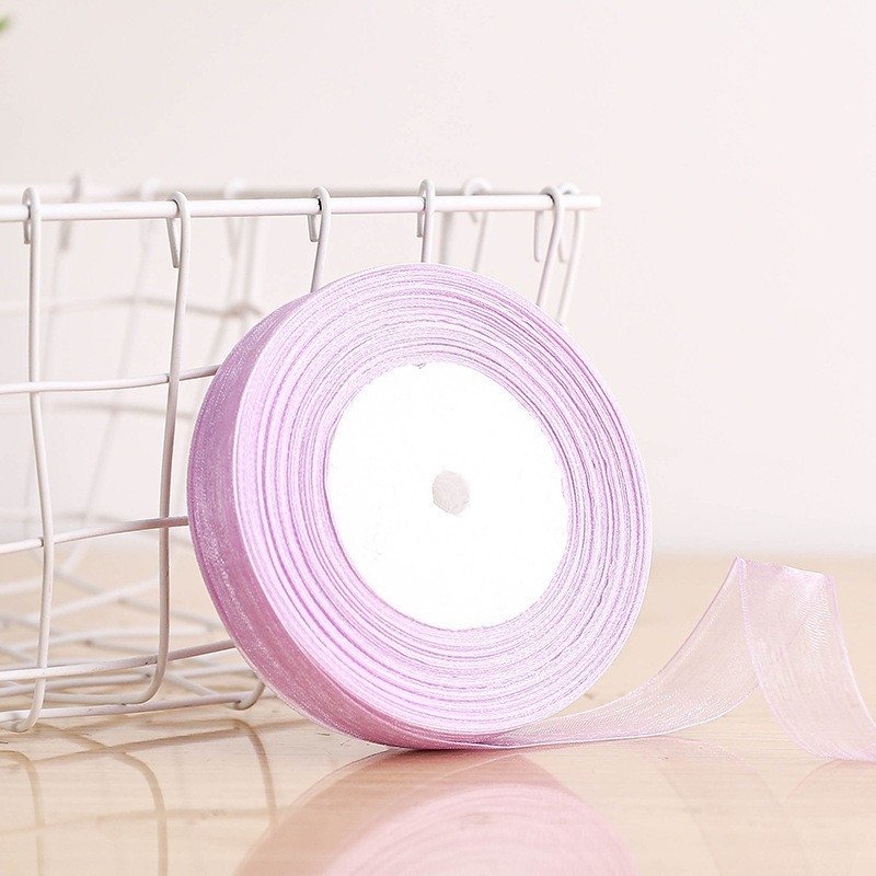 Dekoratyvinė juostelė - 50% viskozės ir 50% dirbtinės medvilnės mišinys; skirta drabužiams, namų tekstilei ir pramoninei naudojimui