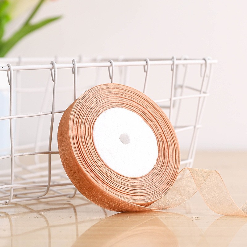 Dekoratyvinė juostelė - 50% viskozės ir 50% dirbtinės medvilnės mišinys; skirta drabužiams, namų tekstilei ir pramoninei naudojimui