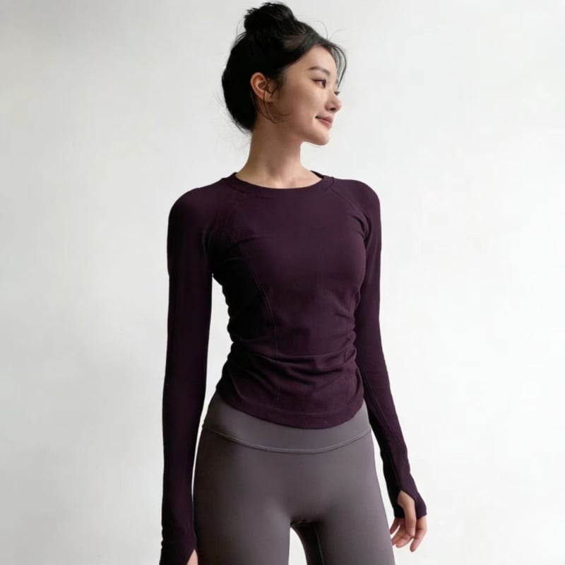Moterų jogos tops – ilgomis rankovėmis, klubų ilgio, aukšta elastė, greitai džiūstantis audinys, Spandeksas 6% su nailono pamušalu 94%