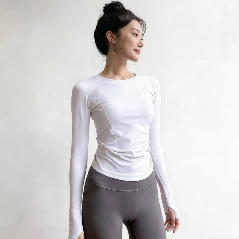 Moterų jogos tops – ilgomis rankovėmis, klubų ilgio, aukšta elastė, greitai džiūstantis audinys, Spandeksas 6% su nailono pamušalu 94%