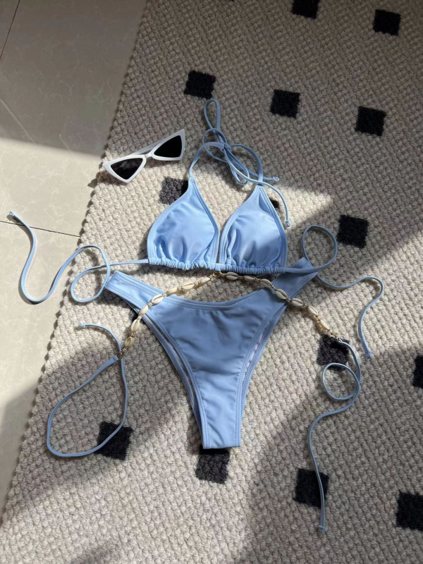 Kupaći bikini: halter, trokutasti gornji dio, bez leđa, visoka elastičnost, s jastučićem za prsima; poliester 82%, podstava 18% spandex.