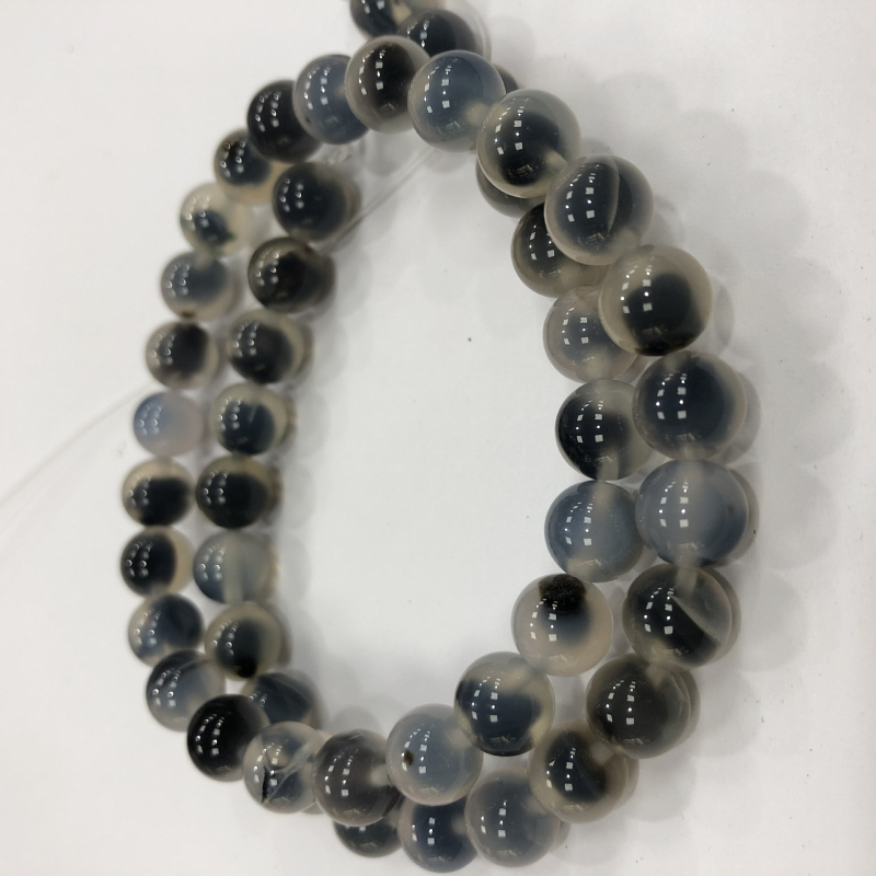 Karkötőkhöz való szabad gyöngyök: cukor-szív minta; kerek forma; agat anyag; feldolgozási technika vágás, csiszolás, polírozás; származás Yiwu