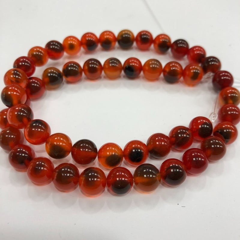 Karkötőkhöz való szabad gyöngyök: cukor-szív minta; kerek forma; agat anyag; feldolgozási technika vágás, csiszolás, polírozás; származás Yiwu