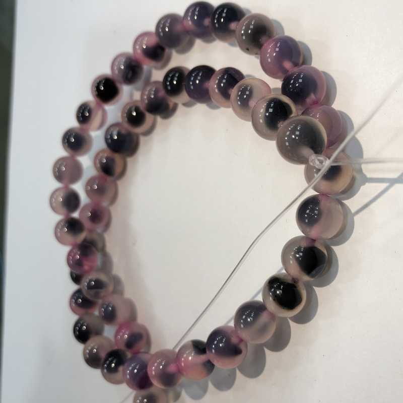Karkötőkhöz való szabad gyöngyök: cukor-szív minta; kerek forma; agat anyag; feldolgozási technika vágás, csiszolás, polírozás; származás Yiwu