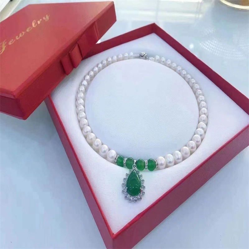 Colier s bisernih perli i privjeskom od legure (Brand: Xinjue Jewelry; Lanac: lanac od bisernih perli; Materijal: perla; Privjesak: legura; Stil: jednostavno)