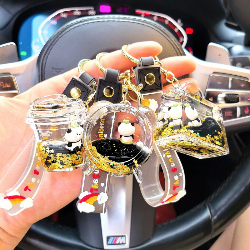 Lanț de chei din acril cu panda în lichid într-o sticluță, pandantiv desen animat