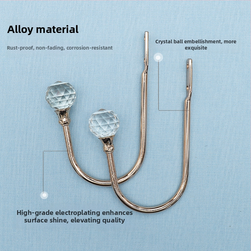 Závesový háčik z kovovej zliatiny s krištáľovými detailmi, moderný jednoduchý dizajn, na stenu.