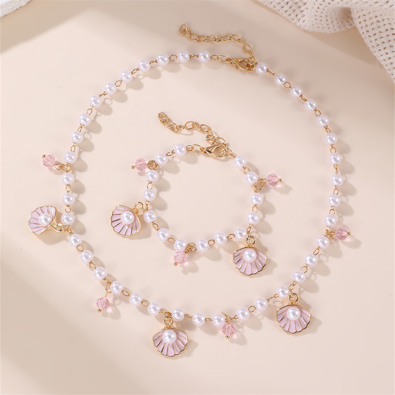 Bērnu kaklarota ar jūras gliemežvākiem un jūras zvaigznes motīvu, imitācijas pērlītes no sveķiem, lodīšu kaklasaite, apkārtmērs 21–50 cm