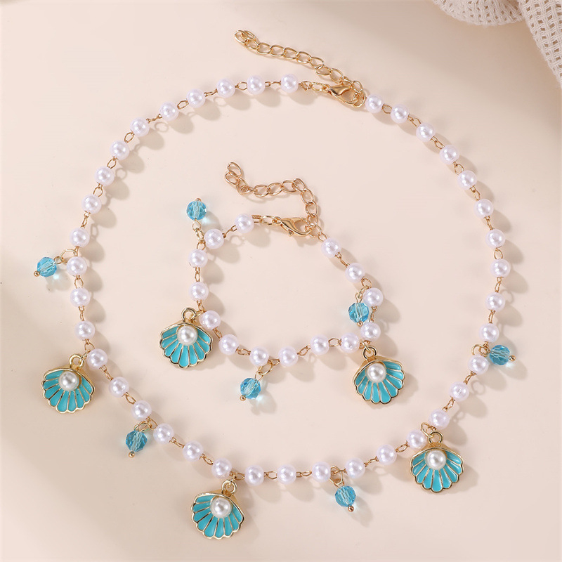 Bērnu kaklarota ar jūras gliemežvākiem un jūras zvaigznes motīvu, imitācijas pērlītes no sveķiem, lodīšu kaklasaite, apkārtmērs 21–50 cm