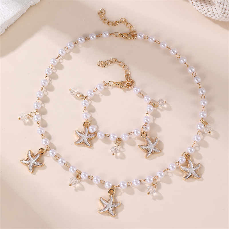 Bērnu kaklarota ar jūras gliemežvākiem un jūras zvaigznes motīvu, imitācijas pērlītes no sveķiem, lodīšu kaklasaite, apkārtmērs 21–50 cm